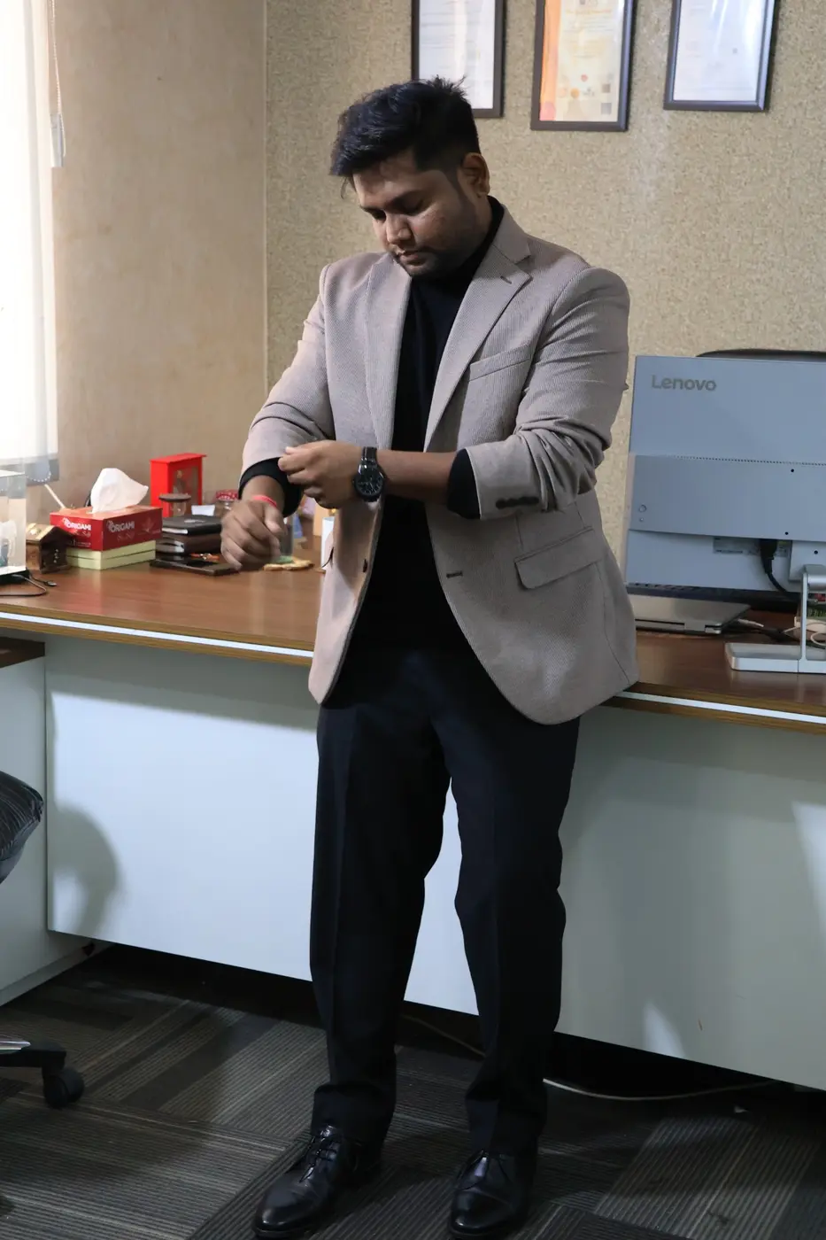 Abhishek Sharma working in an office